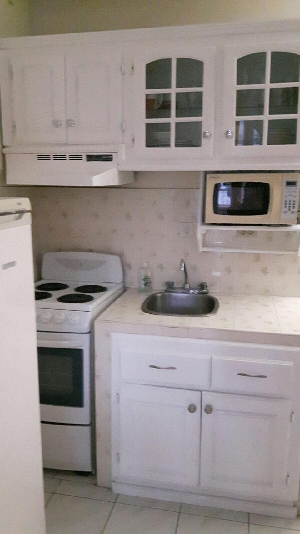 Comfort Studio Suite, 1 King Bed, Non Smoking, Ocean View | Private kitchen | Fridge, microwave, oven, stovetop