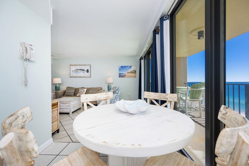 Immerse yourself in the relaxed vibe, enjoying your cozy dining area with breathtaking coastal views just beyond