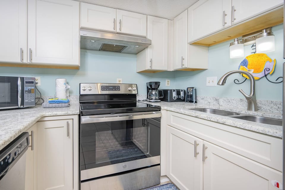 Craft delightful meals while gathering around the sleek countertops, creating lasting memories with loved ones