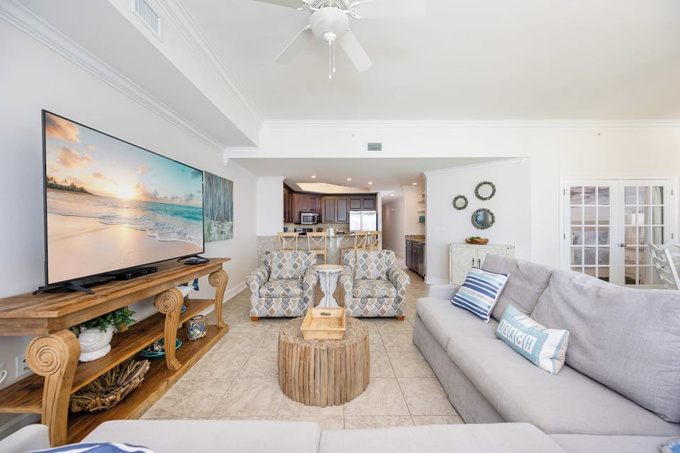 Unwind on the cozy sofa with a queen sleeper while streaming your favorite shows, feeling the beach vibe