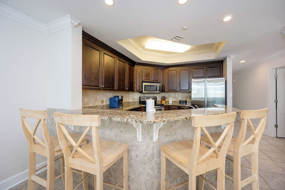 Gather in the kitchen, sipping your favorite drinks at the granite counter, and making lasting memories