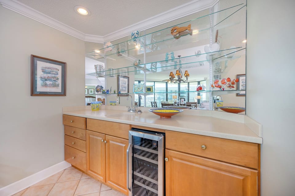 Grab a chilled bottle from the wine cooler or create your favorite cocktail at the wet bar