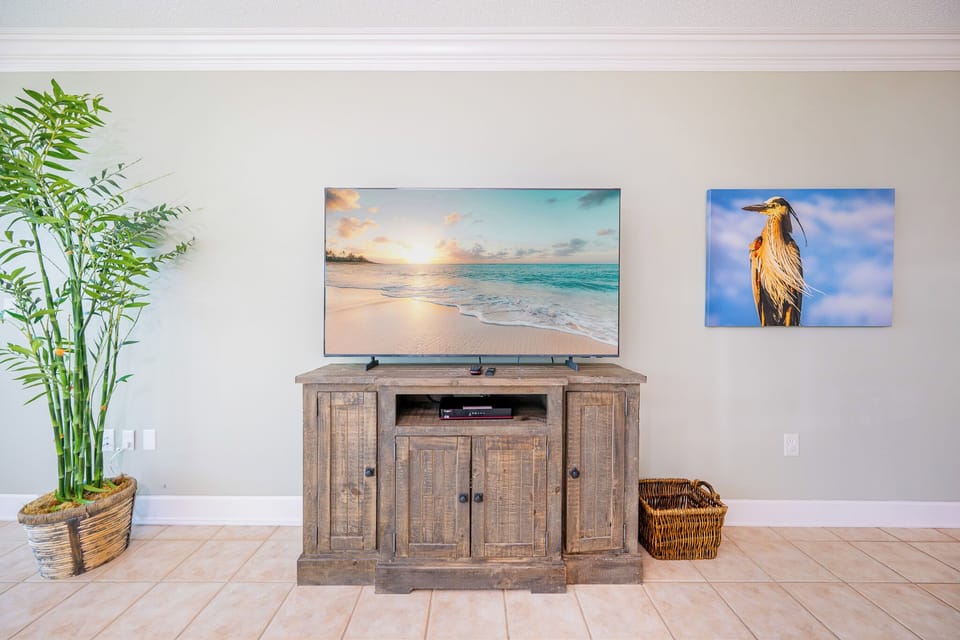 Stream your favorite shows on the TV while enjoying the calming ambiance created by lush greenery accents