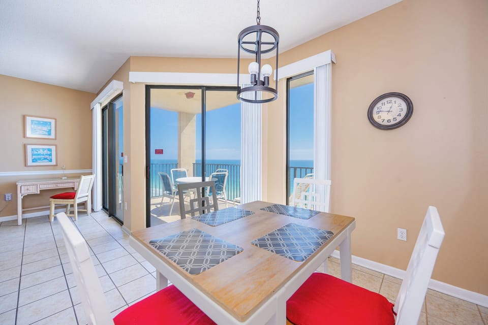 Your dining spot invites laughter and shared meals while gazing out over the endless gulf horizon