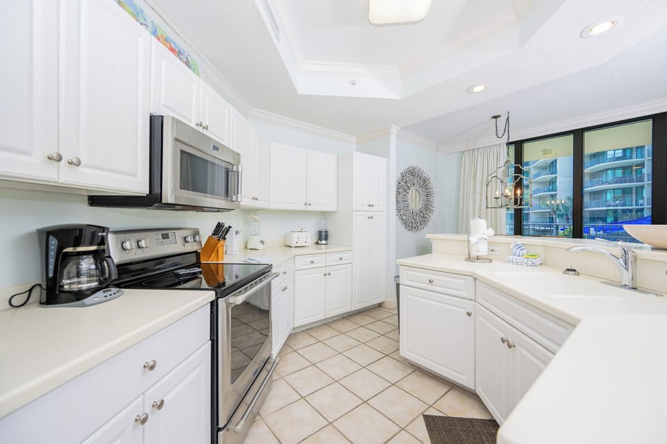 Enjoy the soft, inviting space as you prepare your favorite meals with ease and comfort in this kitchen retreat