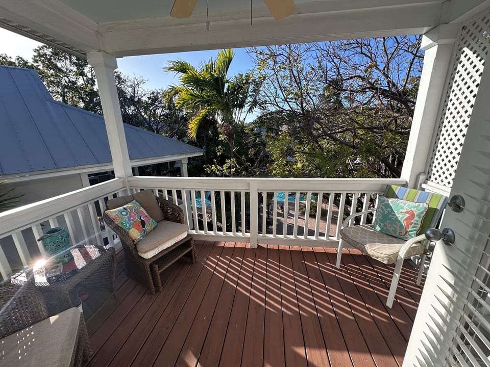 Pool view from upstairs master bedroom balcony