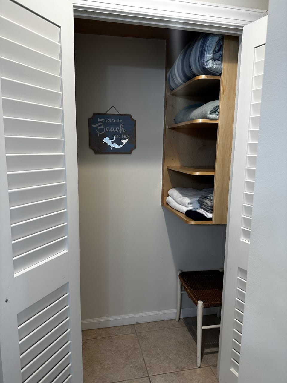 Custom closet in queen bedroom