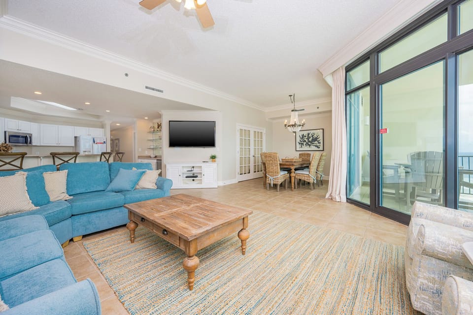 Sink into the plush sofa with a queen sleeper while enjoying movie nights with family in this living space