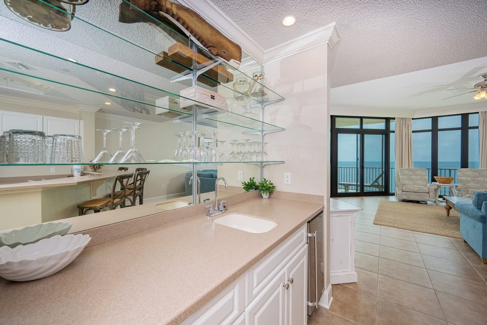 Savor refreshing drinks from the wet bar while enjoying laughter-filled moments with family in the inviting space