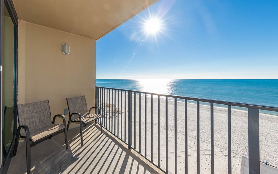 Relax on the balcony soaking in the sun and enjoying the expansive beach views