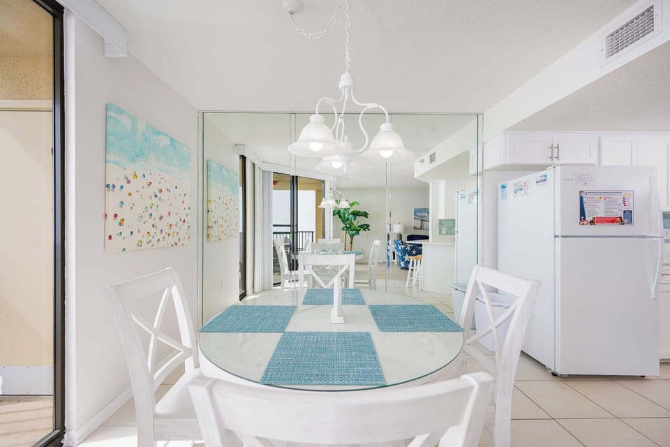 Sunlight warms this dining area where you share meals and laugh with family after beach adventures