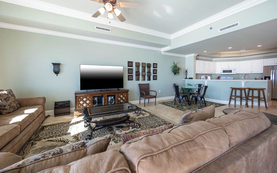 Immerse yourself in leisure as you curl up on the plush couch, enjoying movie nights with loved ones