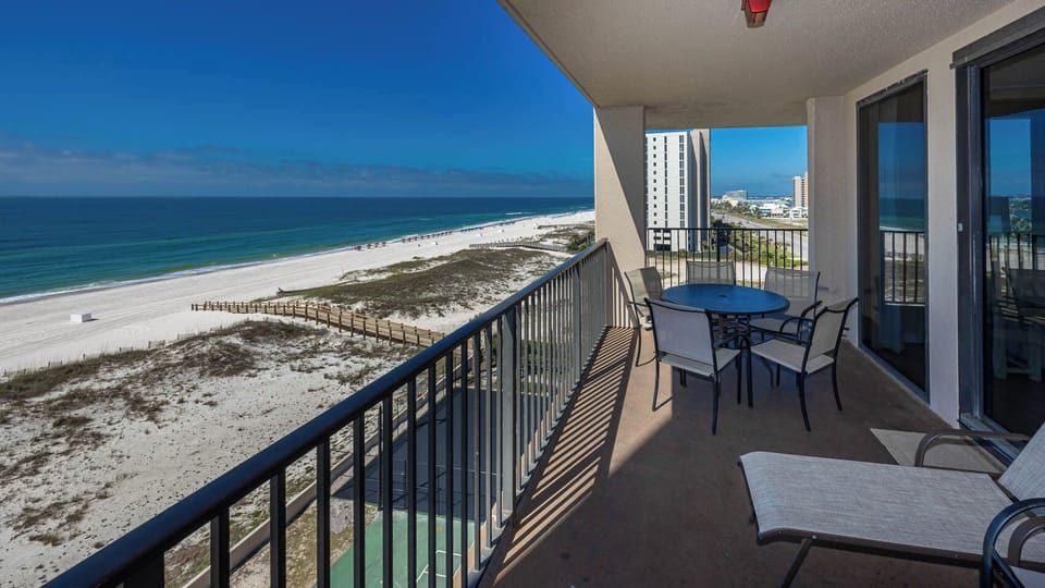 Enjoy meals at the outdoor beachfront balcony while taking in breathtaking views of the coast and calming waters