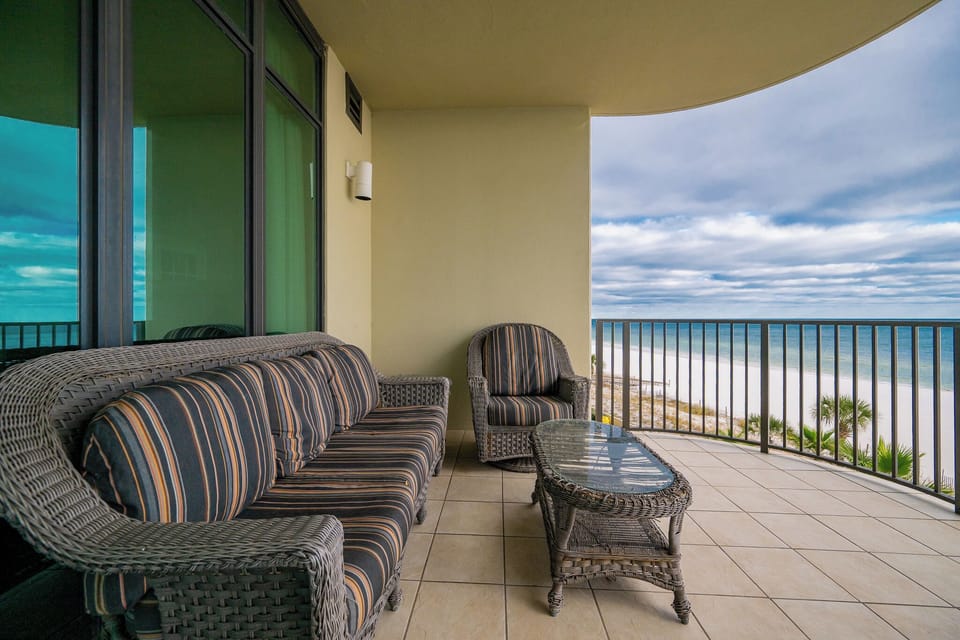 Relax on your balcony and bask in the sunlight with mesmerizing views of the gulf coast on your beach retreat