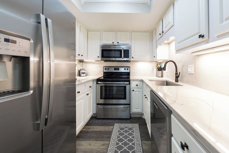 Prepare delicious family meals in this stylish kitchen, enjoying every modern touch