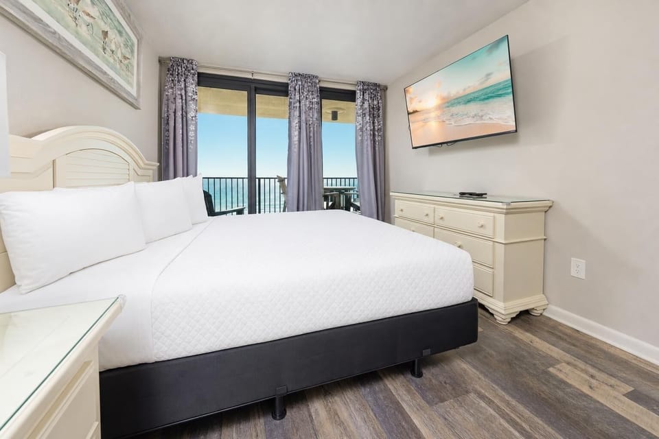 Drift into blissful sleep in the king master suite, while enjoying stunning coastal views from your serene retreat