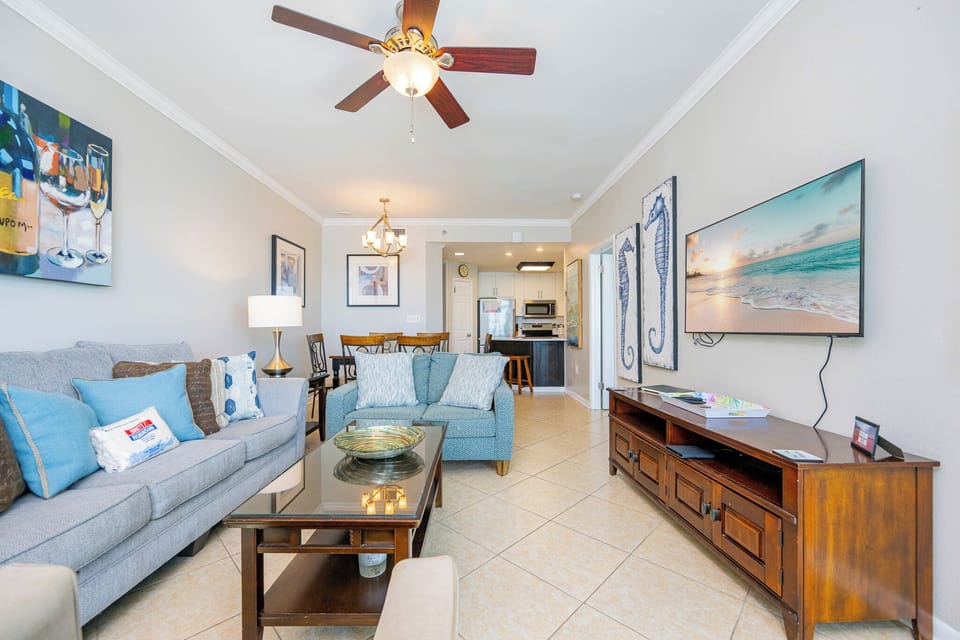 Unwind in the inviting living area, where you can catch a movie or share laughs with family amid charming decor