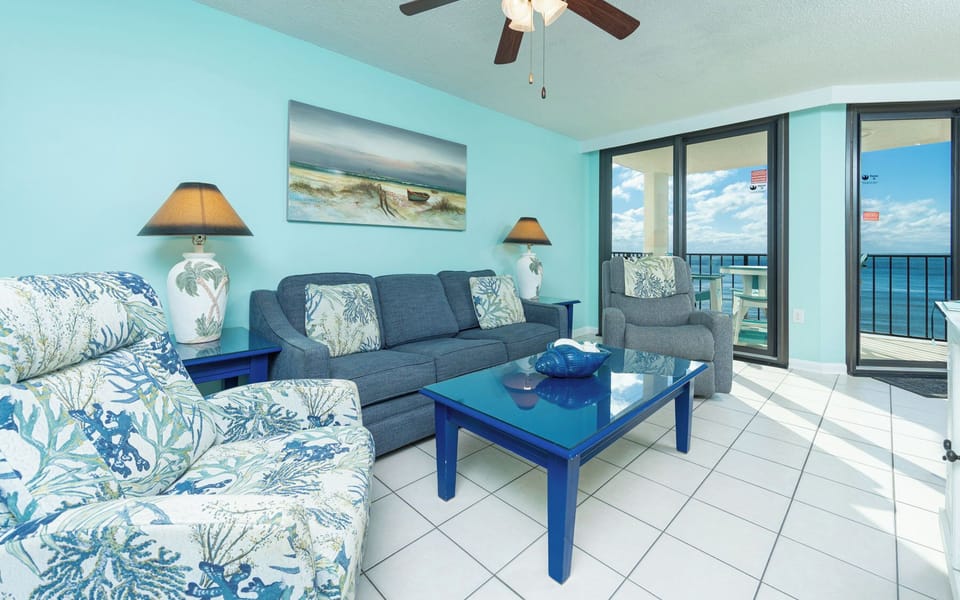 Soft sunlight washes over your living room as you relax and watch the gulf beyond your balcony