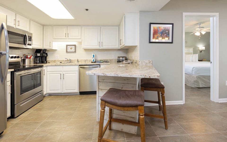Cook and gather at the spacious kitchen with granite countertops and a breakfast bar
