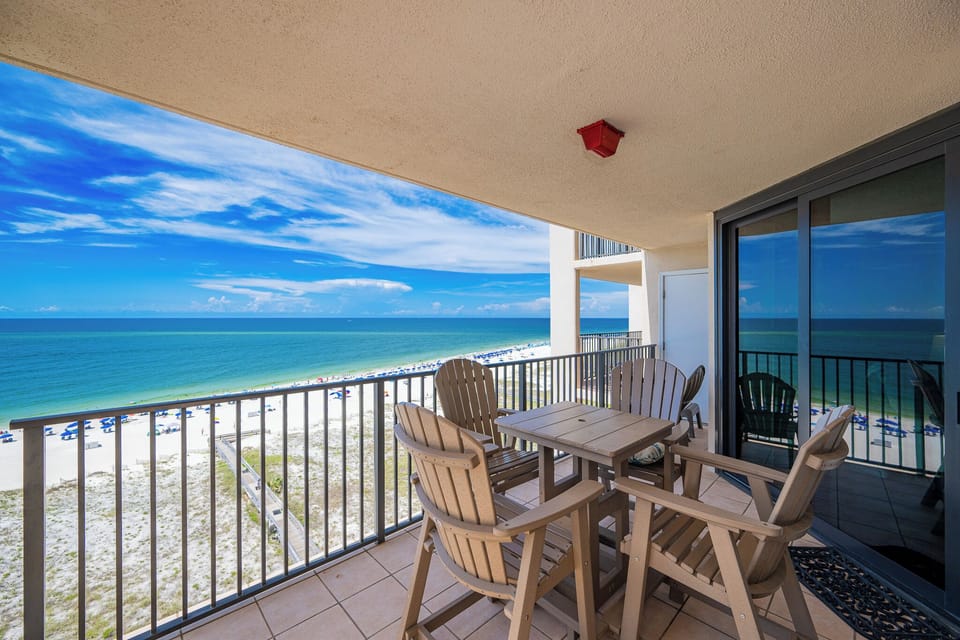 Relax on the balcony enjoying panoramic views of the tranquil water and inviting beach below