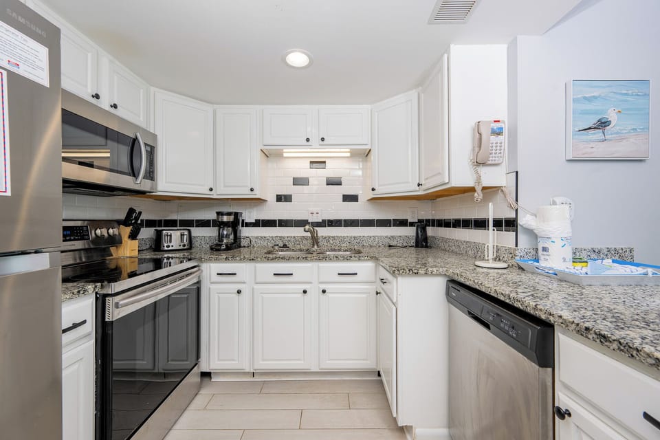 Craft your favorite family meal amidst the stylish finishes and welcoming vibe of this inviting kitchen space