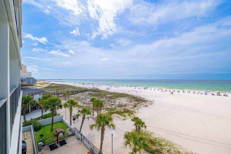 Stunning views of the tranquil waters and shoreline from your balcony, perfect for relaxation and soaking in the sun