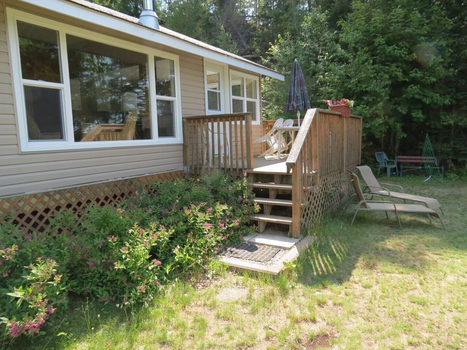Deck with picnic table.  Chaise lounges are included.