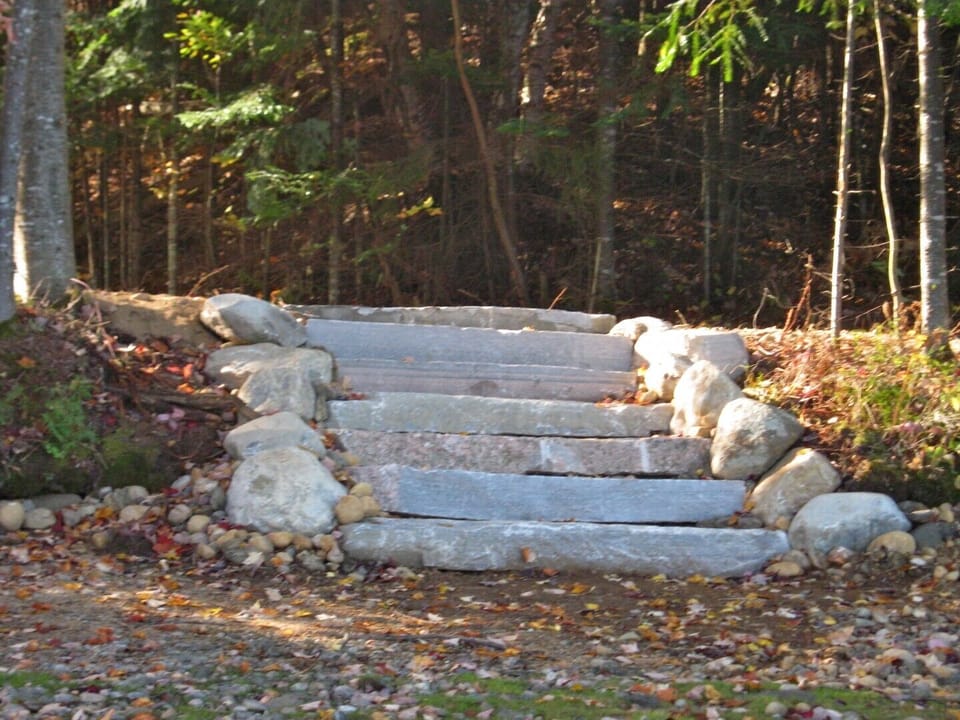 Stone Steps to the Water and Dock.  Nice for sitting on and contemplating.