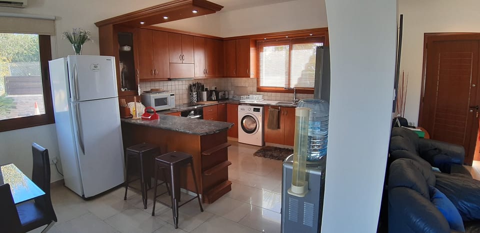 Luxury Villa | Private kitchen | Coffee/tea maker, microwave, electric kettle, highchair
