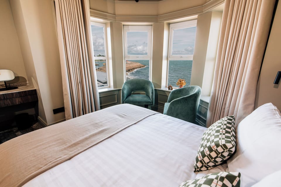 Superior Seaview New | Premium bedding, memory foam beds, in-room safe, individually decorated