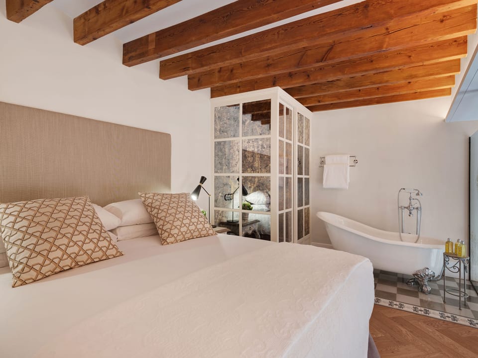 Suite Duplex with Spa Access | Premium bedding, down comforters, minibar, in-room safe