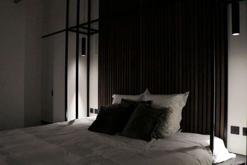 Deluxe Suite, 1 King Bed, Garden View | 1 bedroom, premium bedding, in-room safe, individually decorated