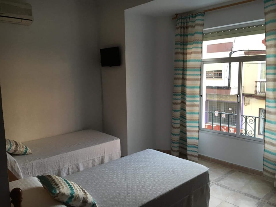 Blackout drapes, free WiFi, bed sheets