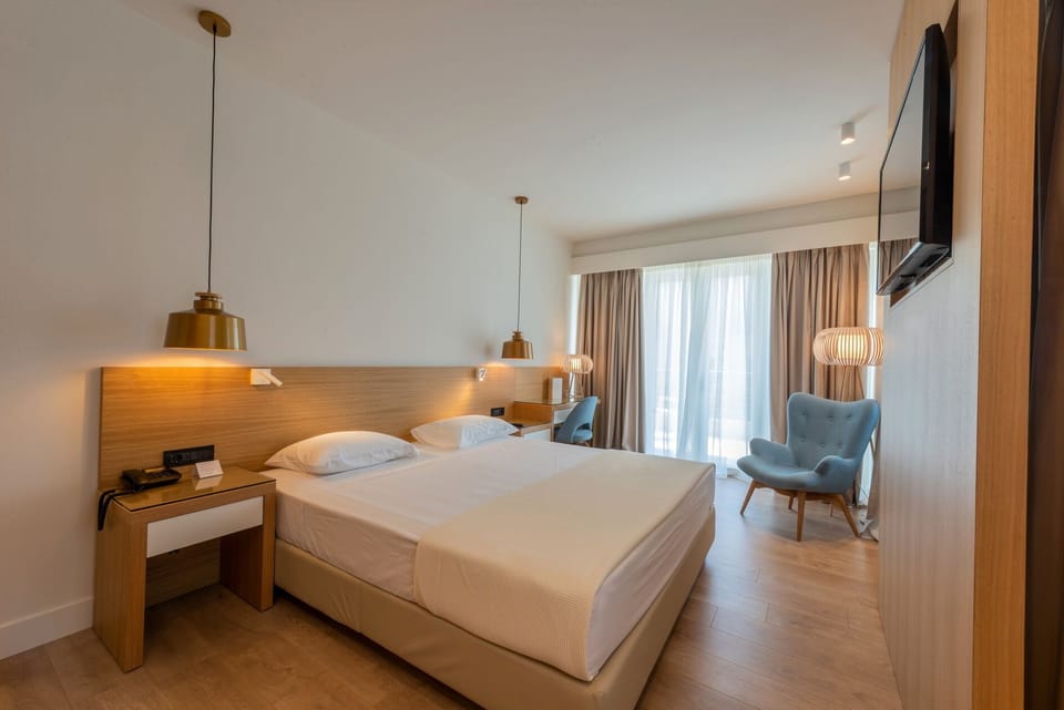 Family Studio | Premium bedding, down comforters, memory foam beds, minibar