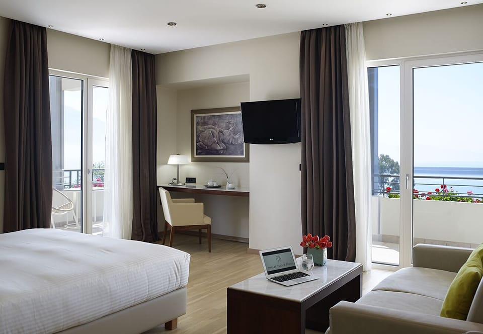 Executive Suite, Sea View | Premium bedding, down comforters, memory foam beds, minibar