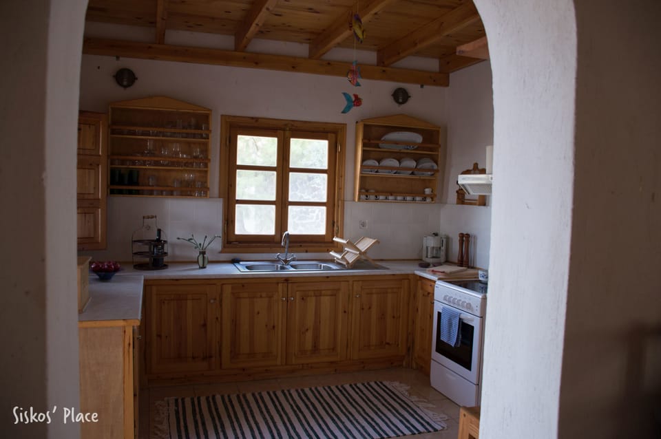 Cottage, 2 Bedrooms, Sea View, Courtyard Area | Private kitchen | Full-size fridge, microwave, oven, stovetop