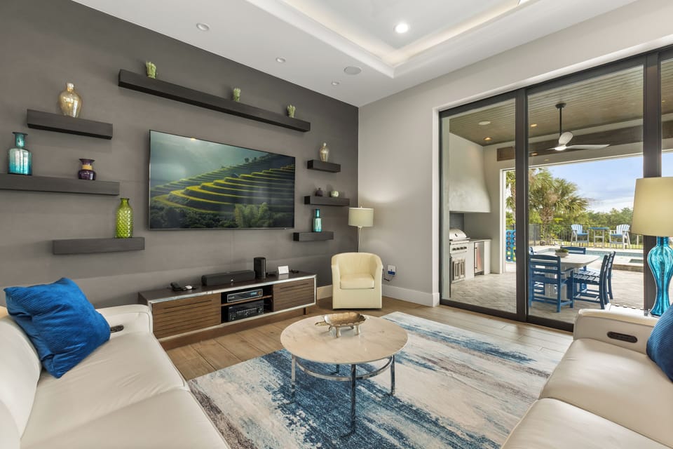 The open floorplan and large sliding glassdoors provide you great views