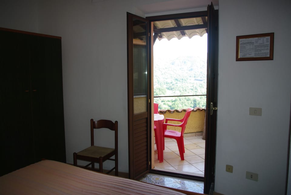 Deluxe Room, Terrace, Mountain View | Minibar, in-room safe, desk, free WiFi