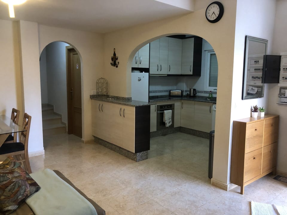 Open plan kitchen well stocked with everything you could need 