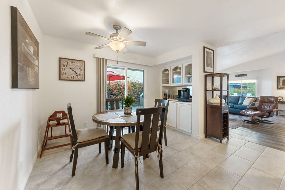 Dining table that can seat up to 6 with highchair. There is also a patio table. 
