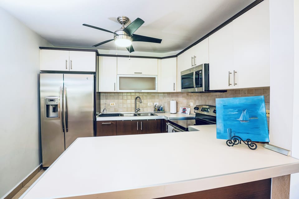 Super clean kitchen. Small appliances are inside cabinets & non-microwaveable 