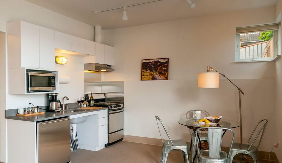 Fully equipped compact kitchen.