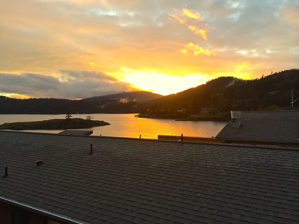 Sunset over the building.