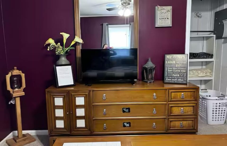 Dresser with TV in king bedroom downstairs 