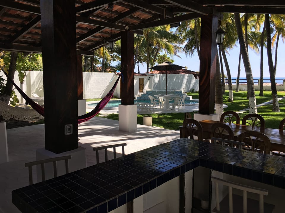 Step out to the bar and lounge area nearest to the pool