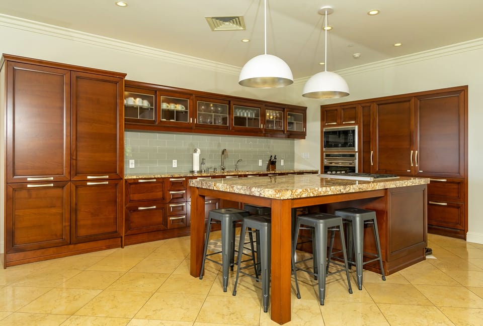 Gourmet kitchen with two SubZero refrigerators and professional appliances