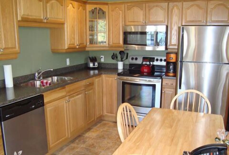 Kitchen furnished with Stainless Steel Applicances