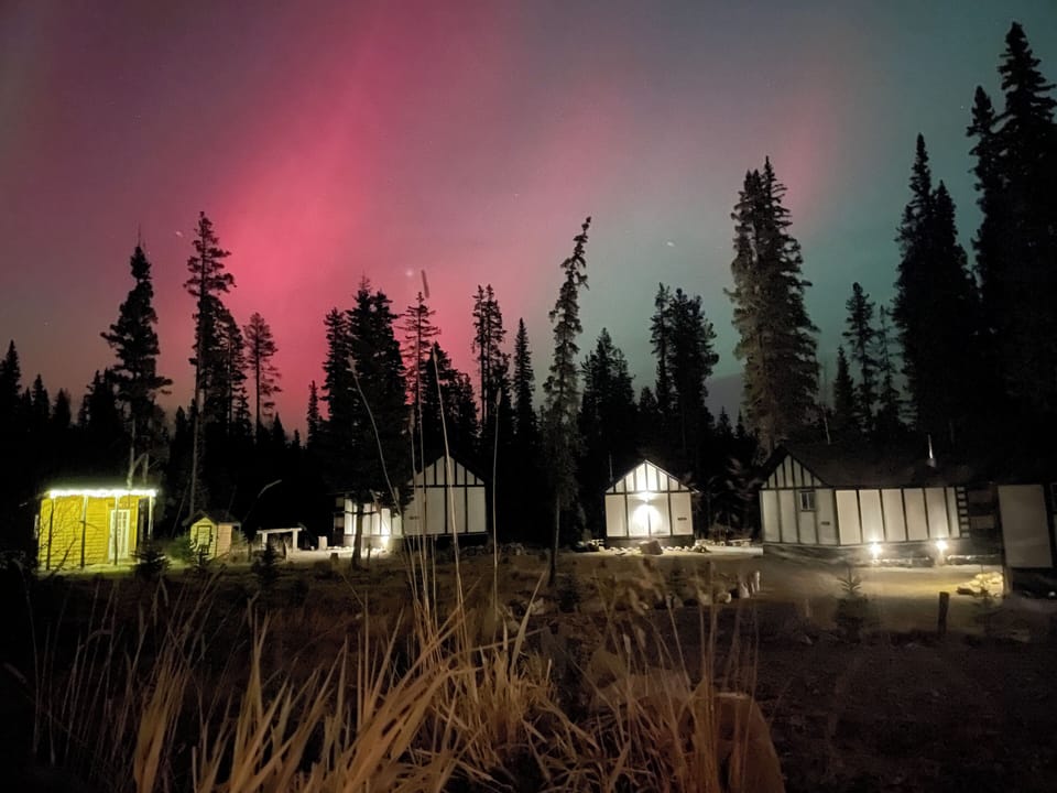 Northern lights over the cabins.
