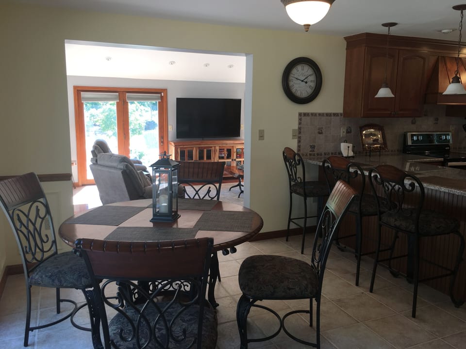 Breakfast Table Leading into Living Area