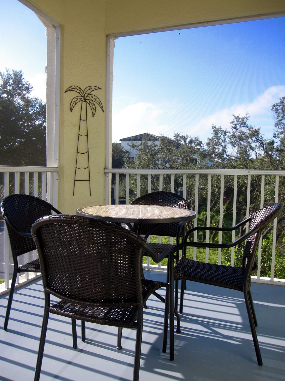 Enjoy coffee in the morning in a screened in balcony! 
